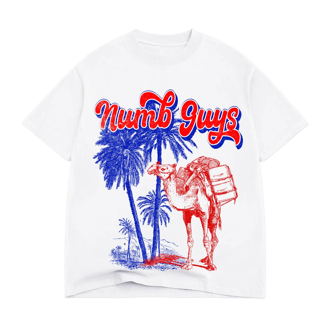 White t-shirt with red and blue graphic design of a camel and palm trees, featuring the text 'Numb Guys'.