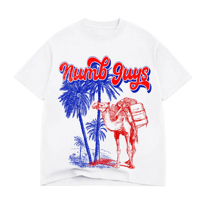 White t-shirt with red and blue graphic design of a camel and palm trees, featuring the text 'Numb Guys'.